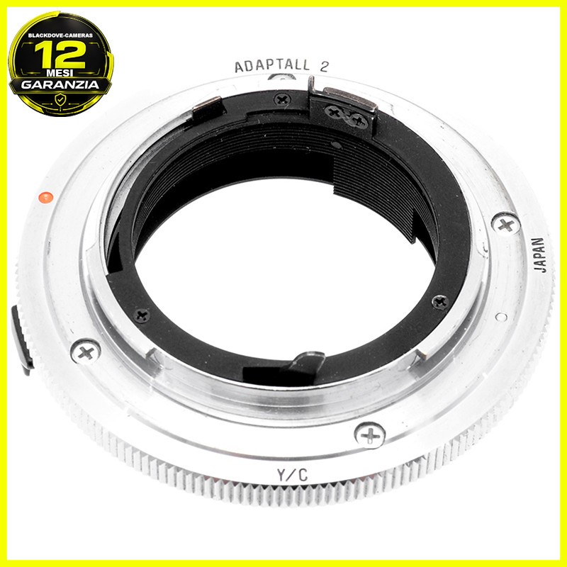 Adattatore Adaptall‑2 FD per obiettivi Tamron su fotocamere Contax/Yashica. 1 Adattatore Adaptall‑2 FD per obiettivi Tamron su fotocamere Contax/Yashica.