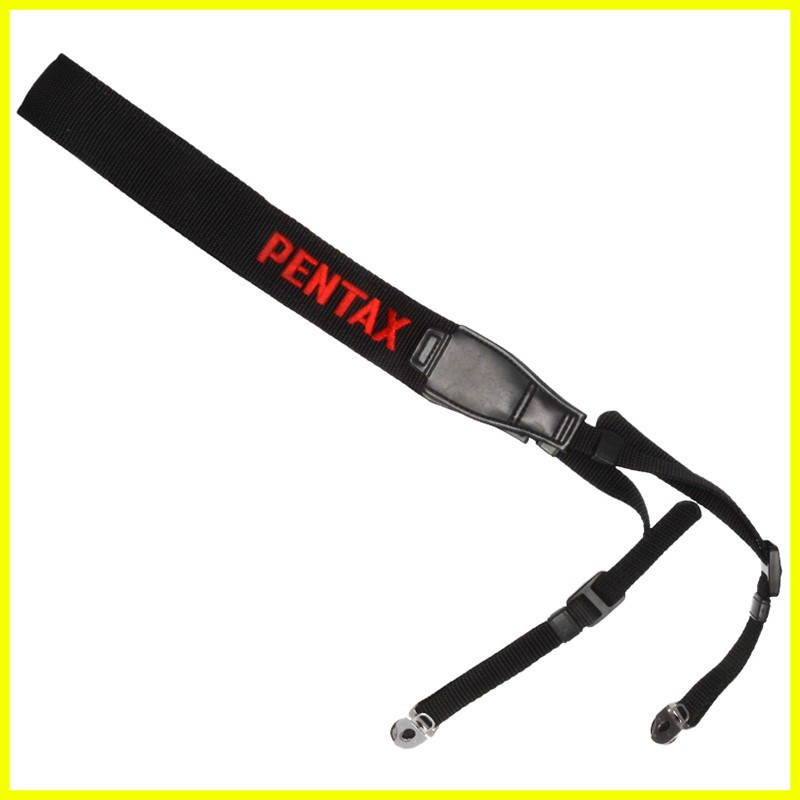 Tracolla originaleper fotocamere reflex Pentax medio formato. Genuine strap. 1 Tracolla originaleper fotocamere reflex Pentax medio formato. Genuine strap.